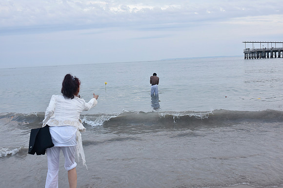 giving flowers to the ancestors